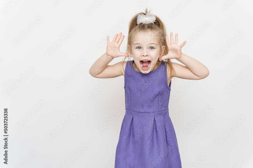 portrait of a little girl with a shocked expression. Wow offer concept. portrait of a little girl with a shocked expression. Wow offer concept.