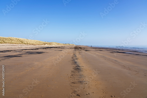 A blue sky spring morning on East Chevington Bay beach in Northumberland