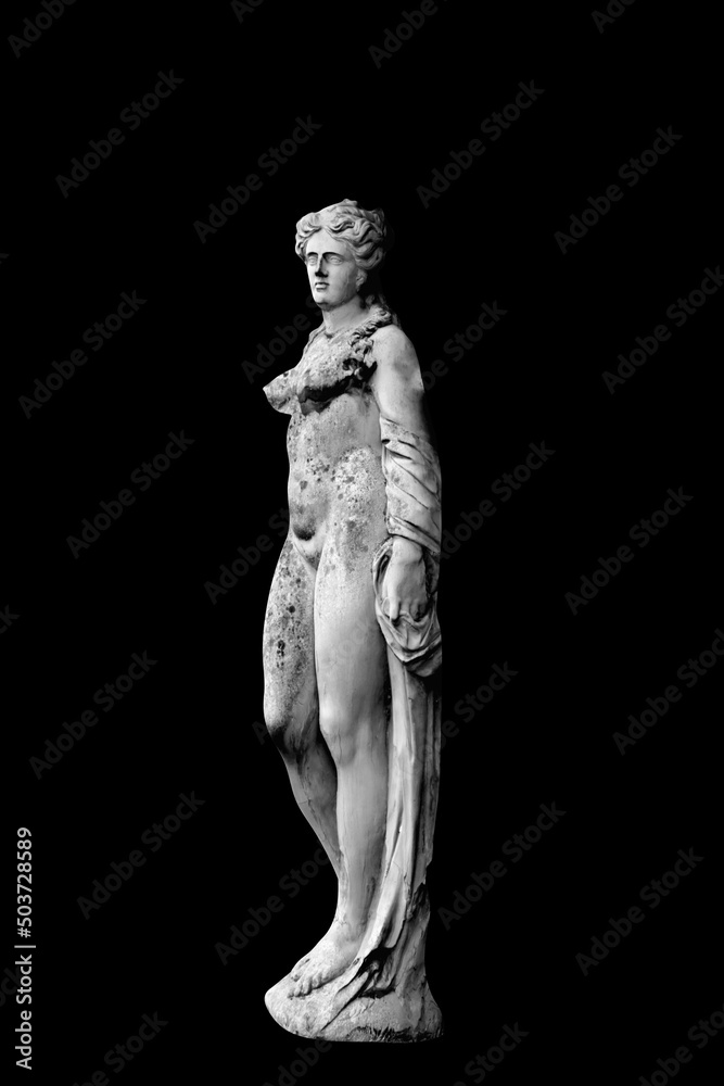 Olympic goddess of love and beautty Aphrodite (Venus). Antique mythology. An ancient statue isolated on black background. Black and white image.. Olympic goddess of love and beautty Aphrodite (Venus). Antique mythology. An ancient statue isolated on black background. Black and white image..