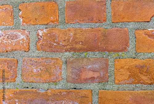red brick wall texture background close up