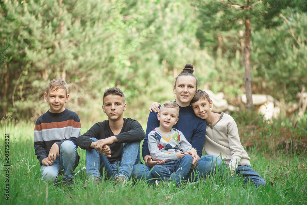 mother with children in a nature park