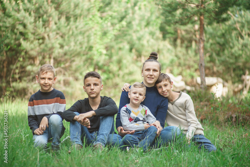 mother with children in a nature park