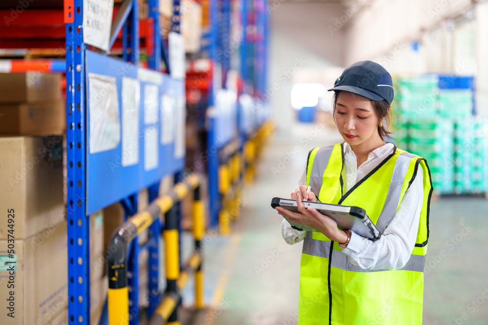 Women warehouse worker with digital tablet. Women warehouse worker with digital tablet.