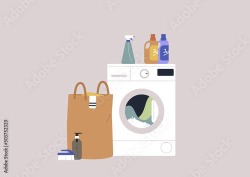 A home laundry set, a washing machine, a basket and a set of detergents