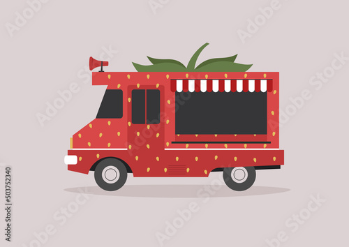 A food truck colored as a strawberry, a dessert bar on the wheels