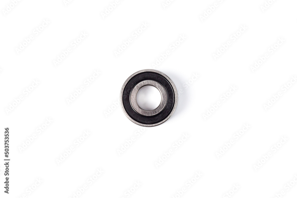 Ball bearing isolated on white background. Metal roller bearing. Super Precision Ball Bearings used in high performance machinery. Ball bearing isolated on white background. Metal roller bearing. Super Precision Ball Bearings used in high performance machinery.
