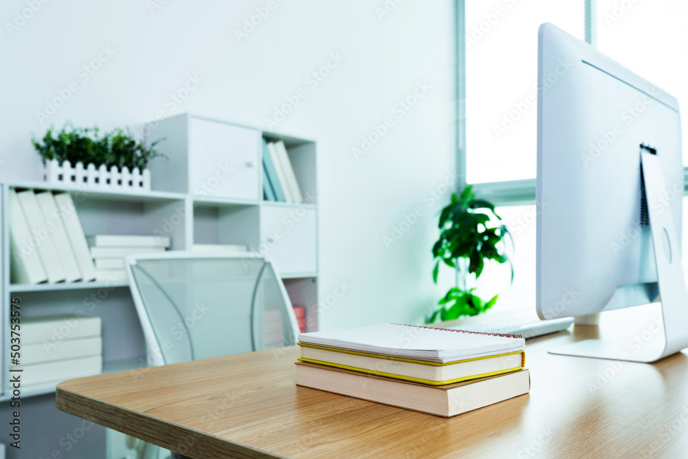 Modern workspace with computer and chair Modern workspace with computer and chair