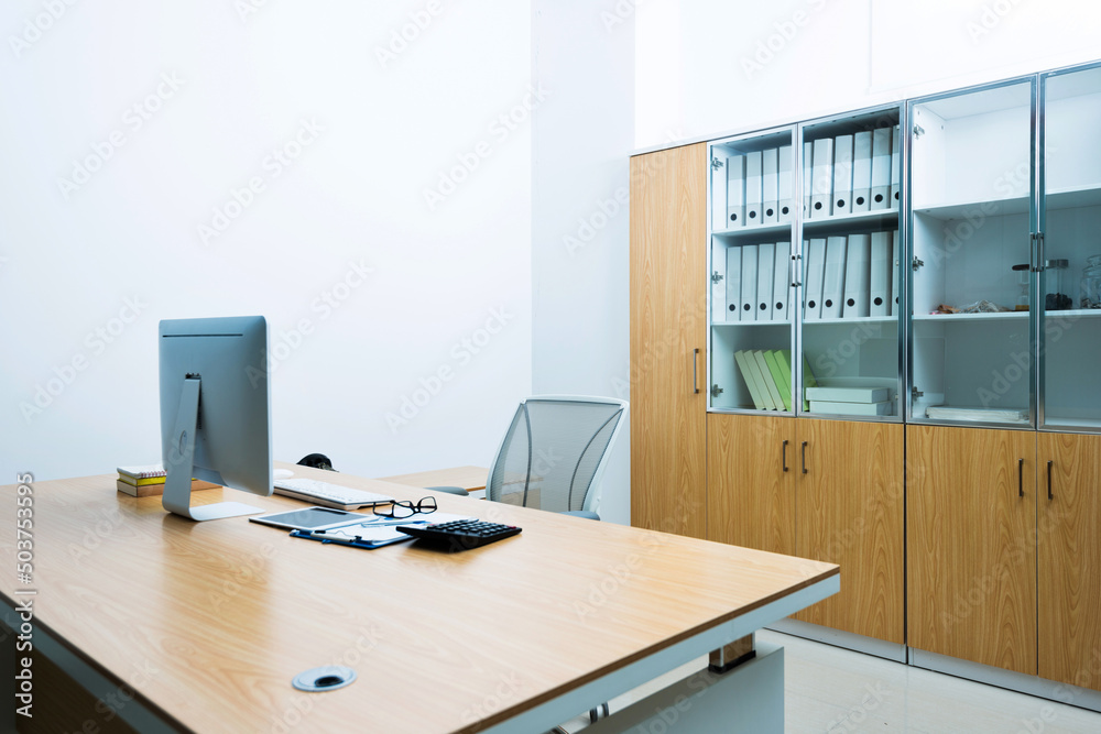 Modern workspace with computer and chair Modern workspace with computer and chair