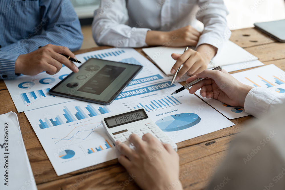 Asian business adviser meeting to analyze and discuss the situation on the financial report in the meeting room.Investment Consultant, Financial advisor and accounting concept Asian business adviser meeting to analyze and discuss the situation on the financial report in the meeting room.Investment Consultant, Financial advisor and accounting concept