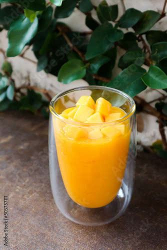 mango smoothie or mango yogurt smoothie , blended mango