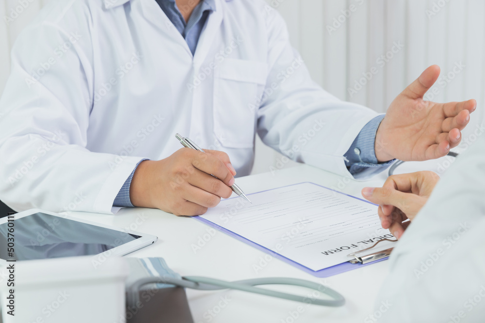 A doctor consulting and explain patient health check in office. Medicine and health care concept. A doctor consulting and explain patient health check in office. Medicine and health care concept.
