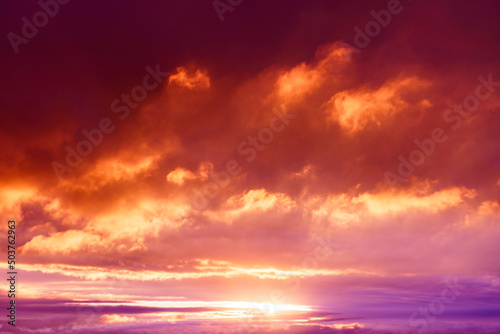 Amazing sky panorama. Great dramatic view. Meditative calmness and greatness. Clouds illuminated by the setting sun. Mystical lighting. Colorful sunset in the evening sky