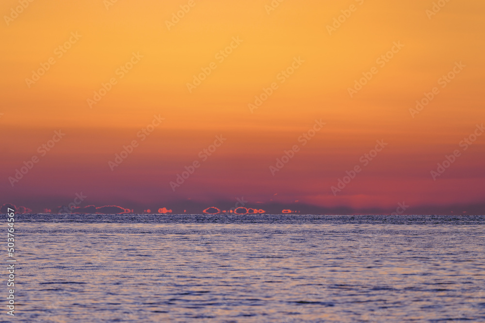 Amazing sky panorama. Clouds illuminated by the setting sun. Meditative calmness and greatness. Great dramatic view. Mystical lighting. Colorful sunset in the evening sky Amazing sky panorama. Clouds illuminated by the setting sun. Meditative calmness and greatness. Great dramatic view. Mystical lighting. Colorful sunset in the evening sky