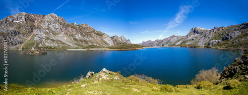 Panoramic view of Lago del Valle in Asturias, Spain. Its waters are crystal clear and reflect the mountains that surround it. Nature in all its splendor.