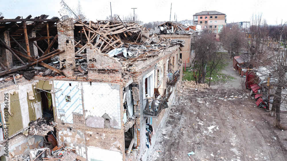 Borodyanka, a part of a residential building destroyed by a rocket. View from a drone, aerial photography Borodyanka, a part of a residential building destroyed by a rocket. View from a drone, aerial photography