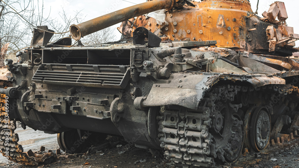 The war in Ukraine, a burned tank on the outskirts of the Ukrainian village, Kyiv region