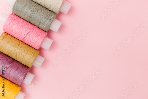 Slika na platnu Sewing tools and sewing accessories on elegant pink background