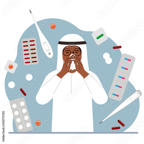 A Muslim man covers his nose with a handkerchief. The concept of a cold person, seasonal allergies. Lots of medicines and thermometers.