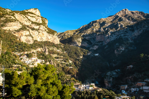 Panoramic view from coastal town Positano on mountain peaks of Monte San Michele, Molare, Canino, Caldare in Lattari Mountains, Apennines, Amalfi Coast, Italy, Europe. Parts of upper Positano village