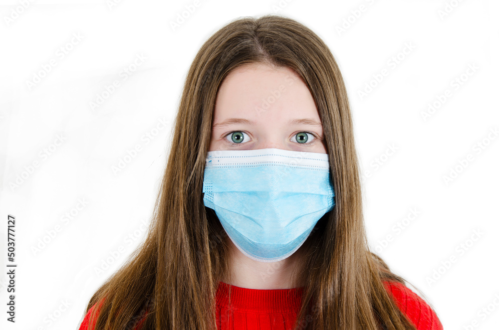 Beautiful teenage girl wearing medical face mask because of air, isolated on white background, copy space. Teenage girl social distancing from corona virus covid-19. Beautiful teenage girl wearing medical face mask because of air, isolated on white background, copy space. Teenage girl social distancing from corona virus covid-19.