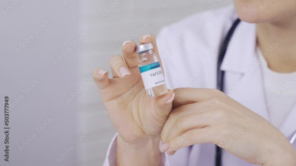 ampoule with vaccine in hand, medicine in vial, ampoule with medicine, medicine ampoule with vaccine in hand, medicine in vial, ampoule with medicine, medicine