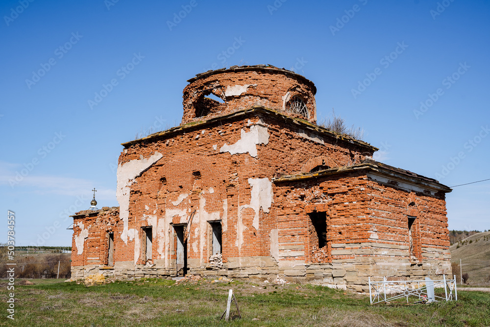 The ruins of an old Orthodox church, an ancient church against the blue ...