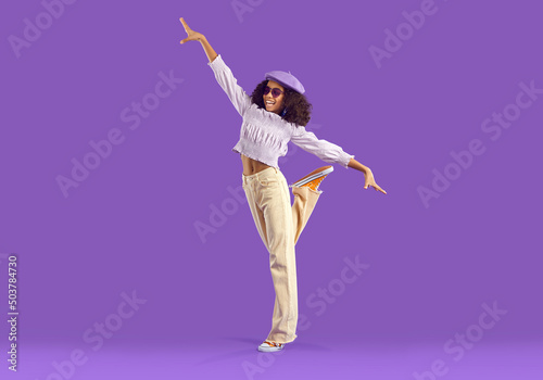 Tableau sur toile Happy kid poses in trendy casual outfit