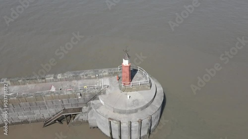 Aerial view of the Watchet Harbor Lighthouse in Somerset, England photo