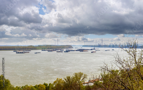 Many barges blocked on the Danube between Galați and Brăila in Romania in the spring of 2022. The context is the war in Ukraine. High resolution.