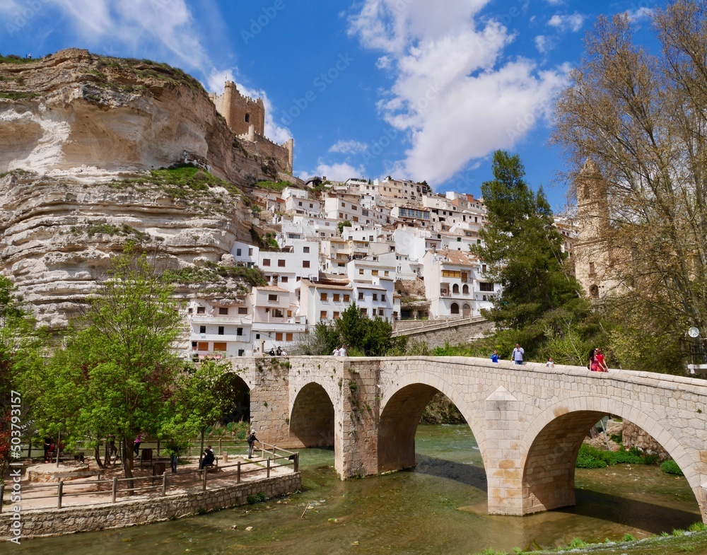 Panoramic view of Alcala del Jucar, castle and Roman bridge over river Jucar. Province of Albacete, Castile La Mancha, Spain.