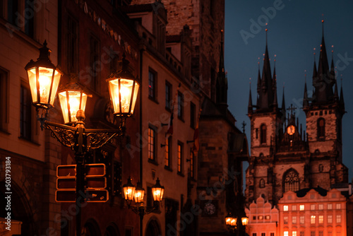 Czech Republic, Prague, Tyn Church, Old Town Square. Nigh city center illumination. Downtown area. Evening lights.