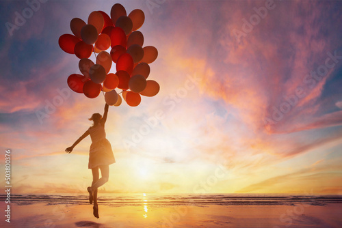 Fototapete creativity and inspiration, woman with many balloons, motivation, imagination co