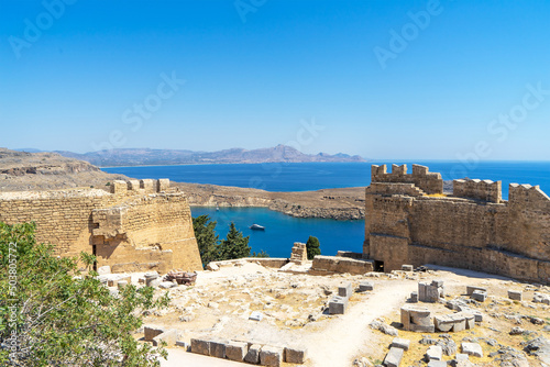 View of the summit of the Acropolis and ruins of Lindos, archaeological site, a fishing village and a former municipality on the island of Rhodes, in the Dodecanese, Greece