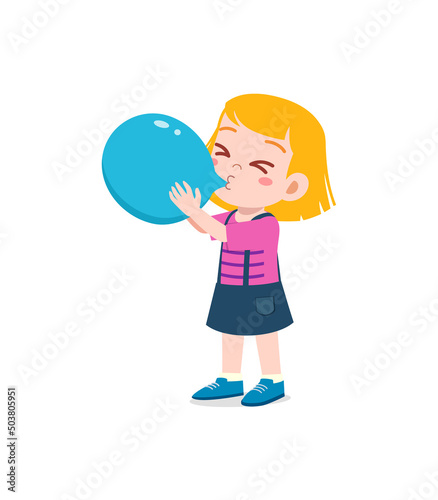 little kid standing and blowing a balloon