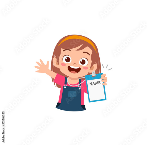 little kid holding name tag and feel happy