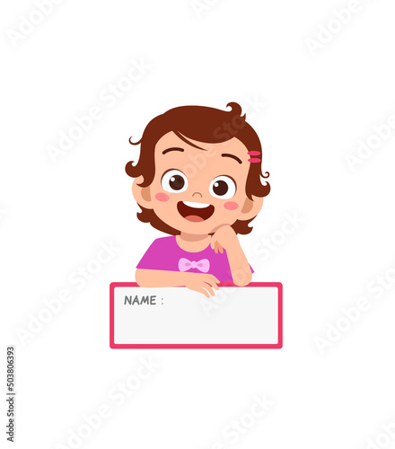 little kid holding name tag and feel happy