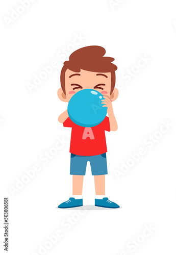 little kid standing and blowing a balloon