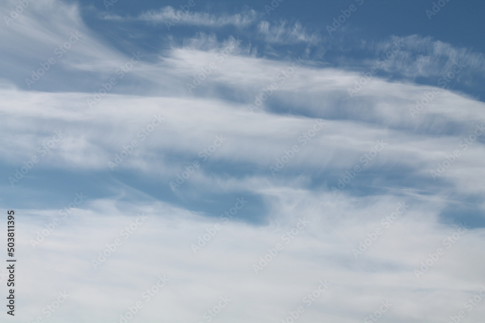 Cirrocumulus lenticularis clouds. Blue sky with white clouds