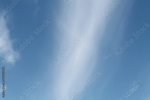 Cirrocumulus lenticularis clouds. Blue sky with white clouds photo