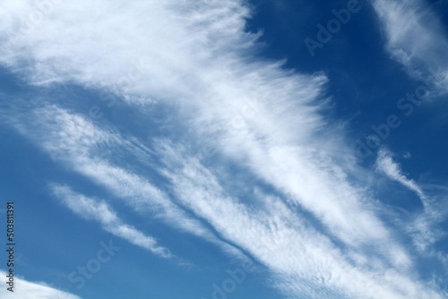 Cirrocumulus lenticularis clouds. Blue sky with white clouds