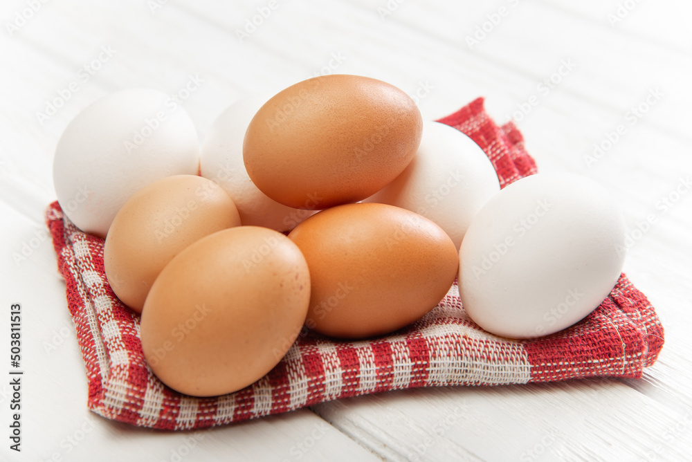 Farm eggs on a light background. Farm eggs on a light background.