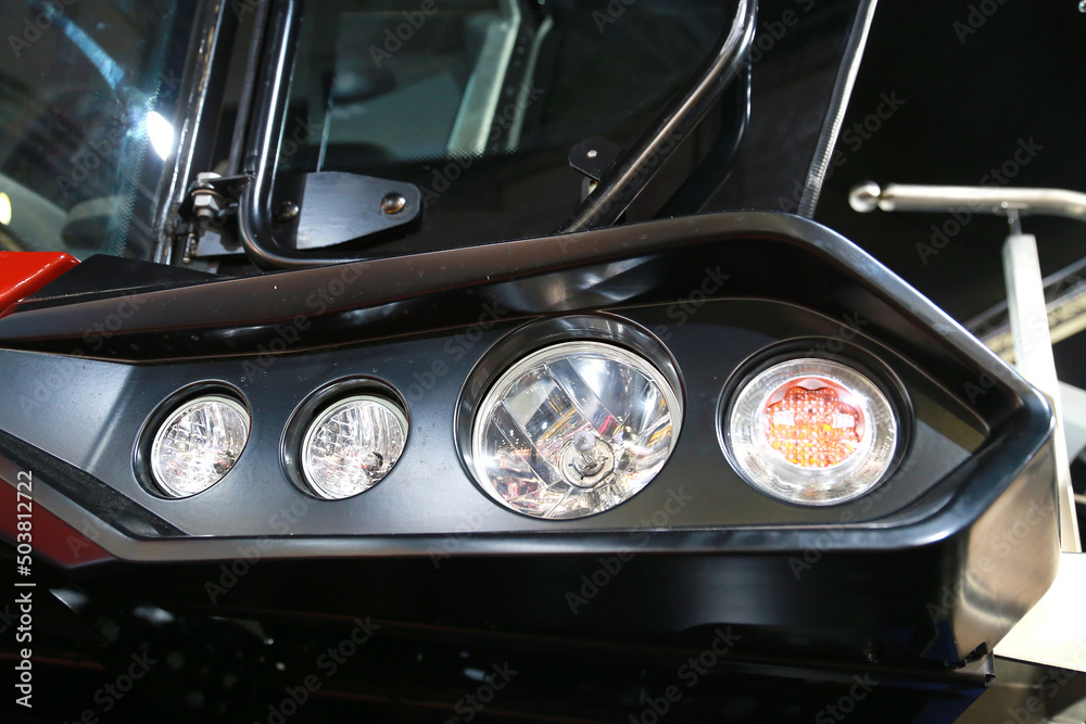 Fototapeta premium front headlights of a combine for harvesting crops