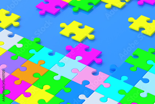 Many unfinished colorful puzzle jiggle pieces on blue background. 3d render