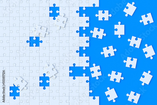 Unfinished jigsaw puzzle pieces on blue background. 3d render