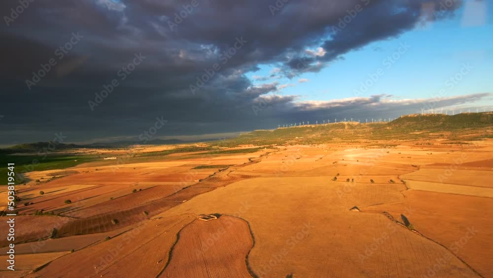 HD of a man sitting on a tower and the countryside roads