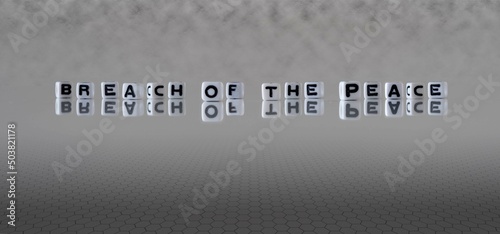 breach of the peace word or concept represented by black and white letter cubes on a grey horizon background stretching to infinity