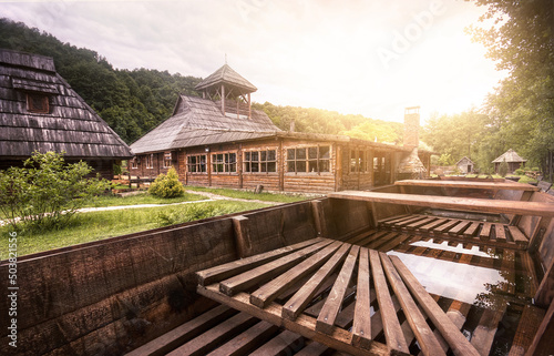 Beautiful view of a little village with wooden houses in Kotromanovicevo near Banja Luka photo