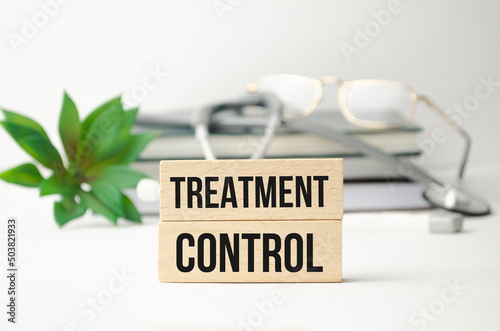 Treatment control on the wooden cubes and plant with stethoscope