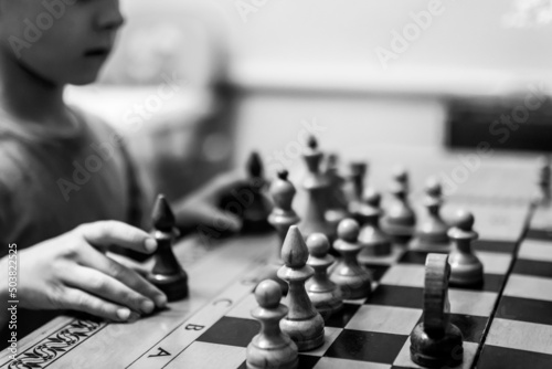 Chess pieces stand on the board. selective focus. Concept of children education