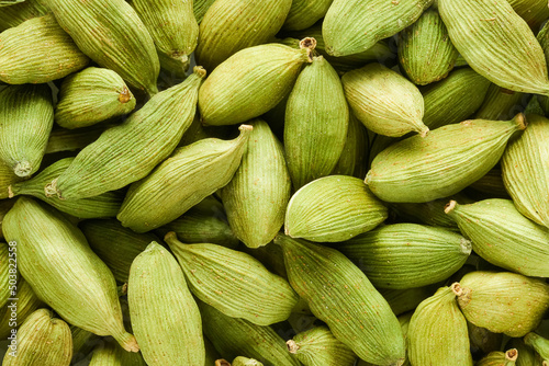 Green organic cardamom or elakka. Food background. Top view. Close up